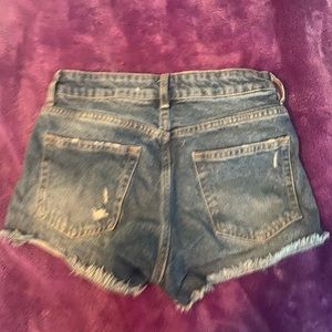 Ripped denim shorts